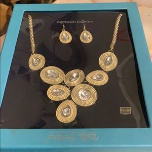 gold necklace with matching earrings